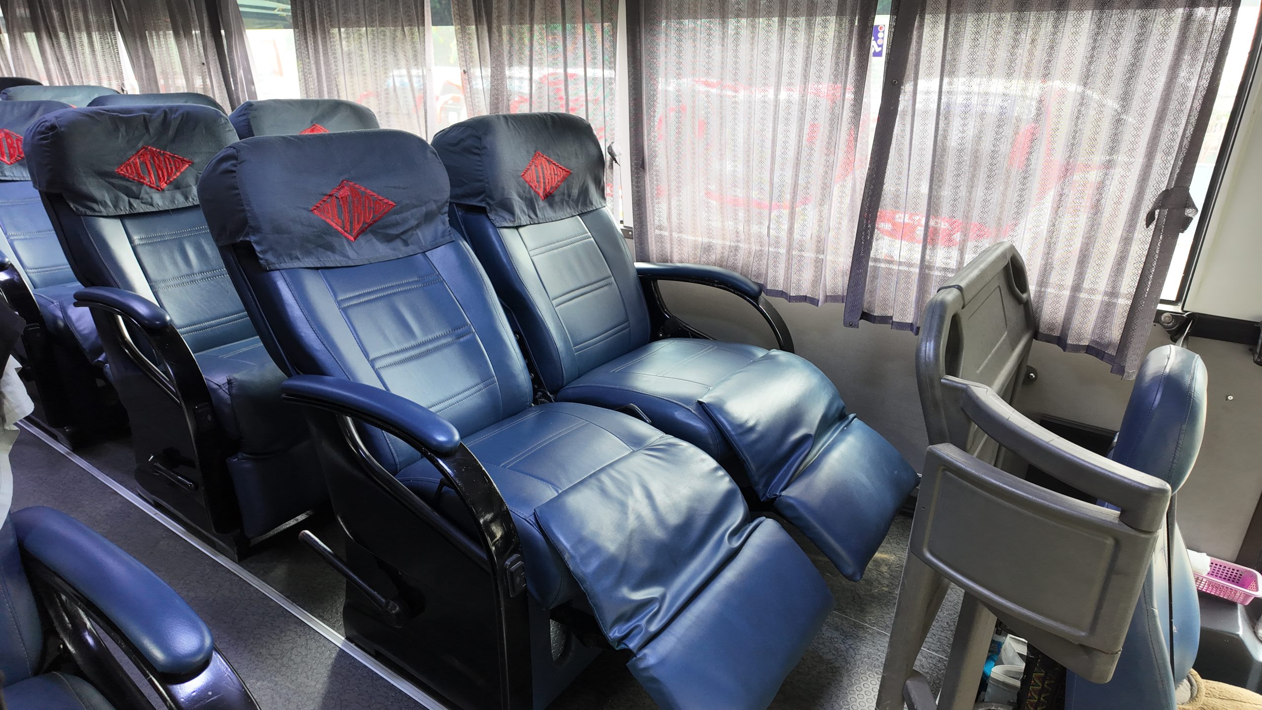 Lazyboy coach — 2x1 reclining seat cabin interior
