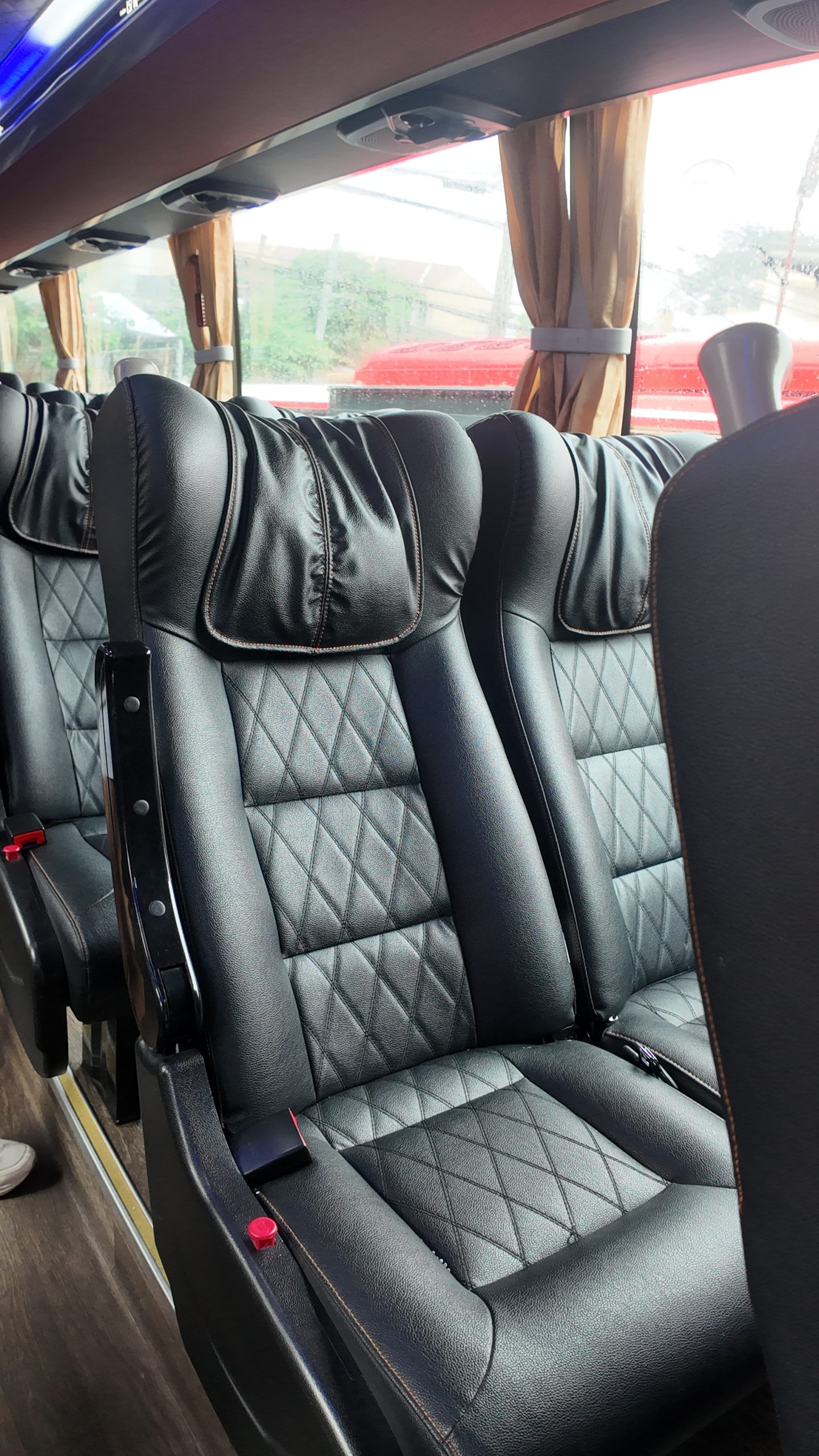 Regular AC with CR coach — 2x2 reclining seat cabin interior